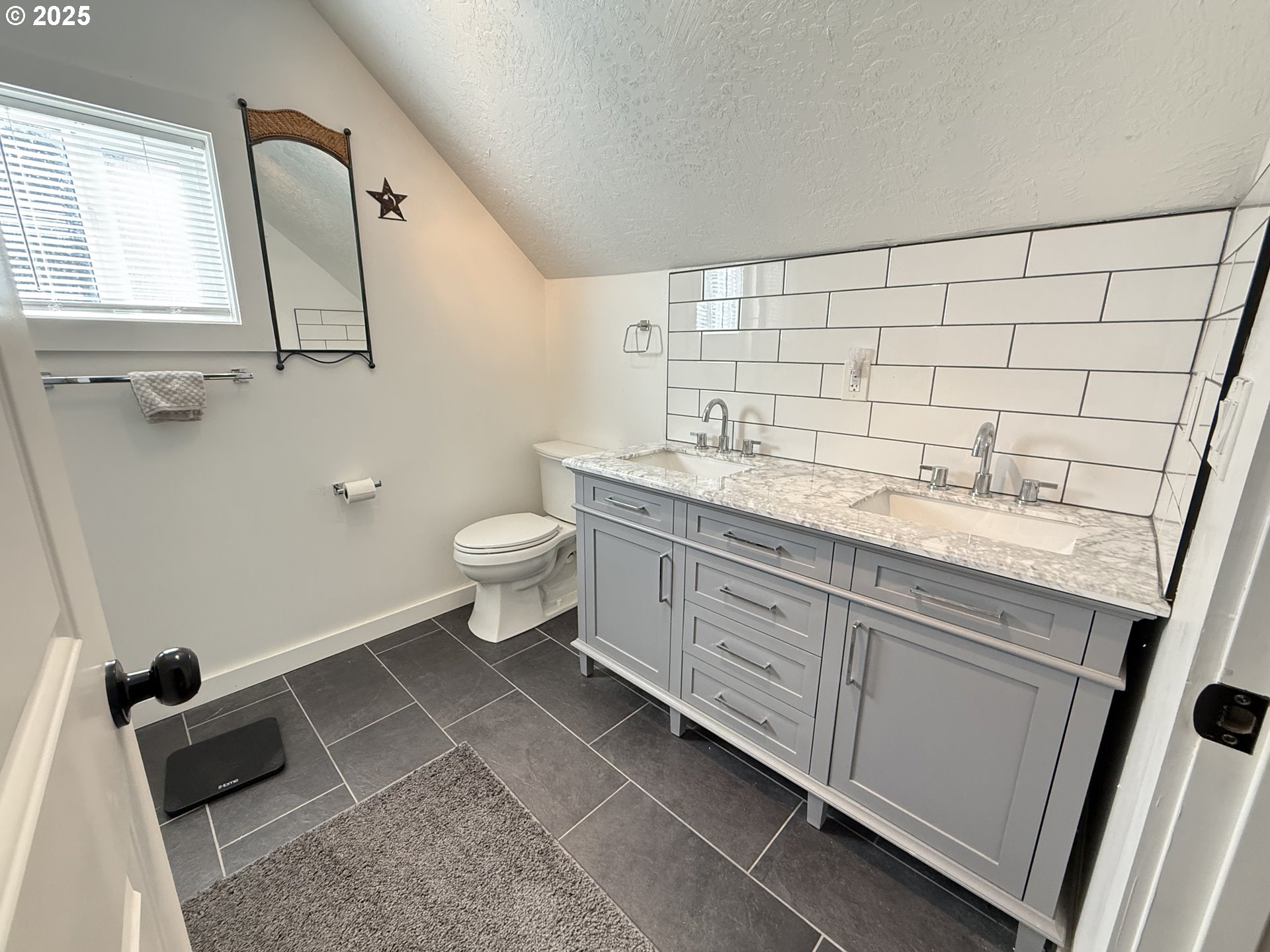 35349 Blitz Lane Blodgett, OR 97326 - Photo 25 of 47 a bathroom with a granite countertop sink toilet and mirror