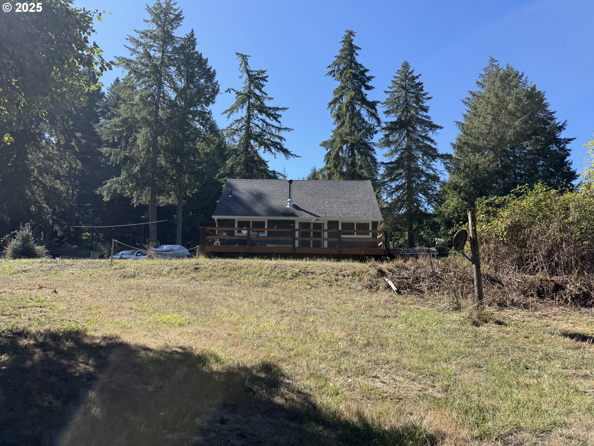35349 Blitz Lane Blodgett, OR 97326 - Photo 28 of 47 a view of a house with a yard