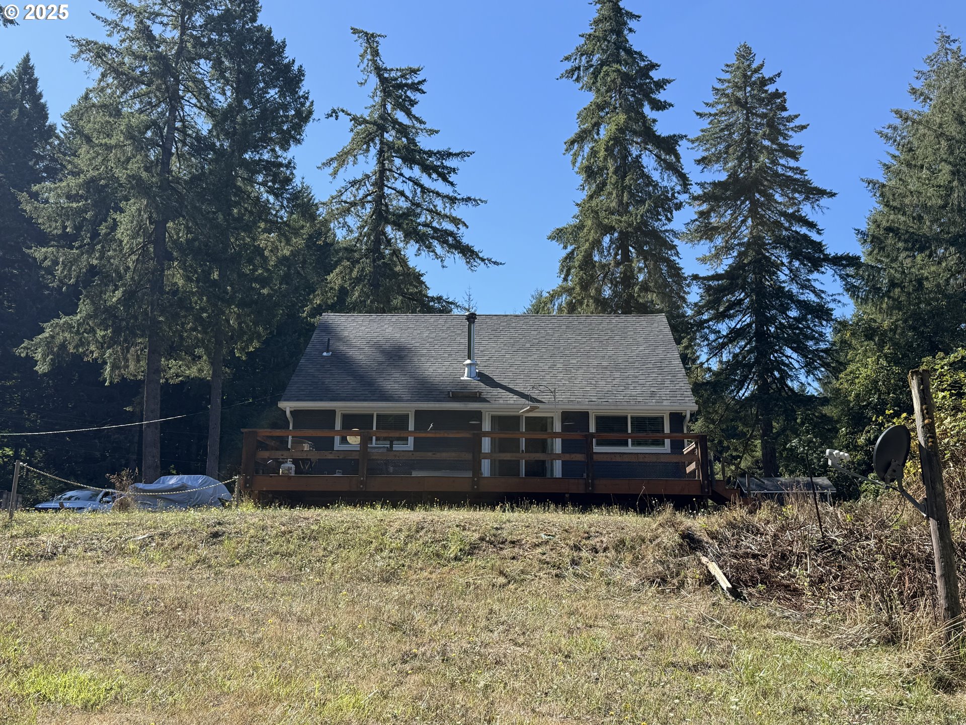 35349 Blitz Lane Blodgett, OR 97326 - Photo 29 of 47 a view of a house with a yard tree and a tree