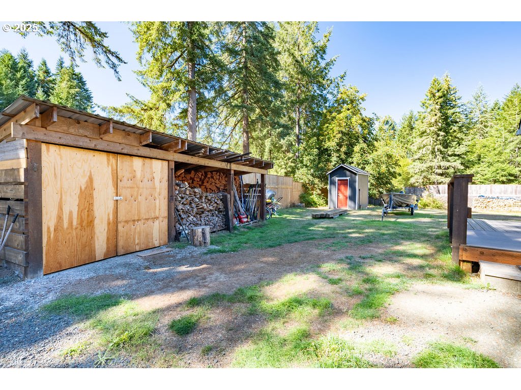 35349 Blitz Lane Blodgett, OR 97326 - Photo 38 of 47 a view of a backyard with large trees and plants