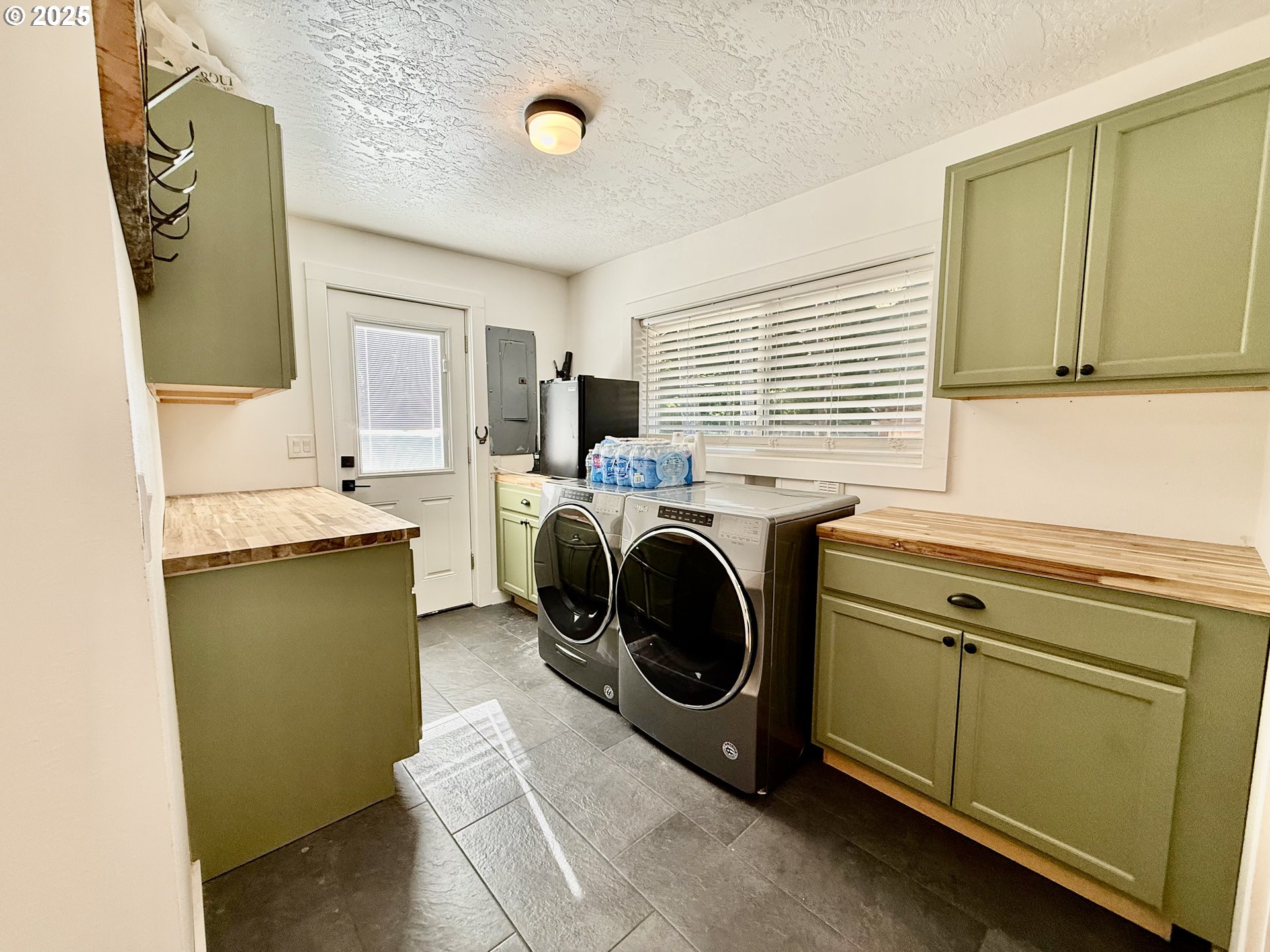35349 Blitz Lane Blodgett, OR 97326 - Photo 8 of 47 a utility room with sink dryer and washer