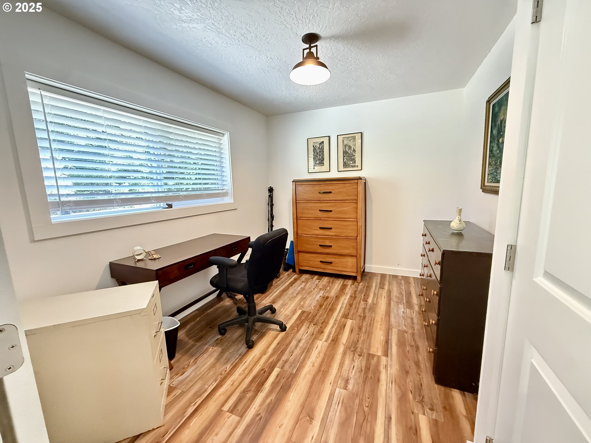 35349 Blitz Lane Blodgett, OR 97326 - Photo 9 of 47 a room with furniture and a window