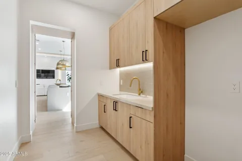 a view of room with furniture and large window