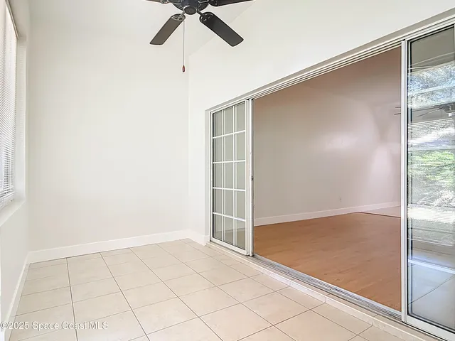a view of an entryway with a chandelier