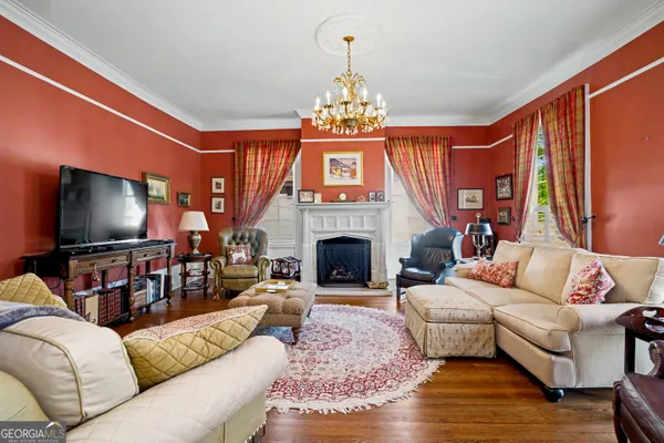 a bathroom with a toilet a sink and shower