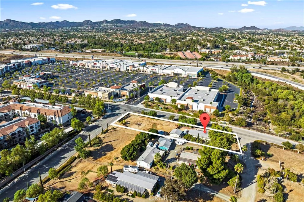an aerial view of residential building and city