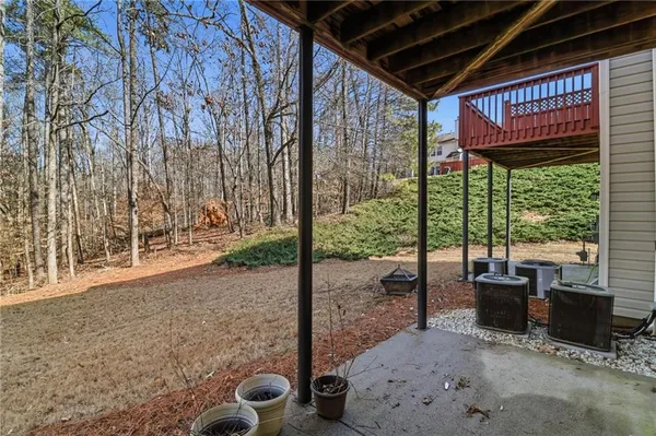 a view of a porch with furniture