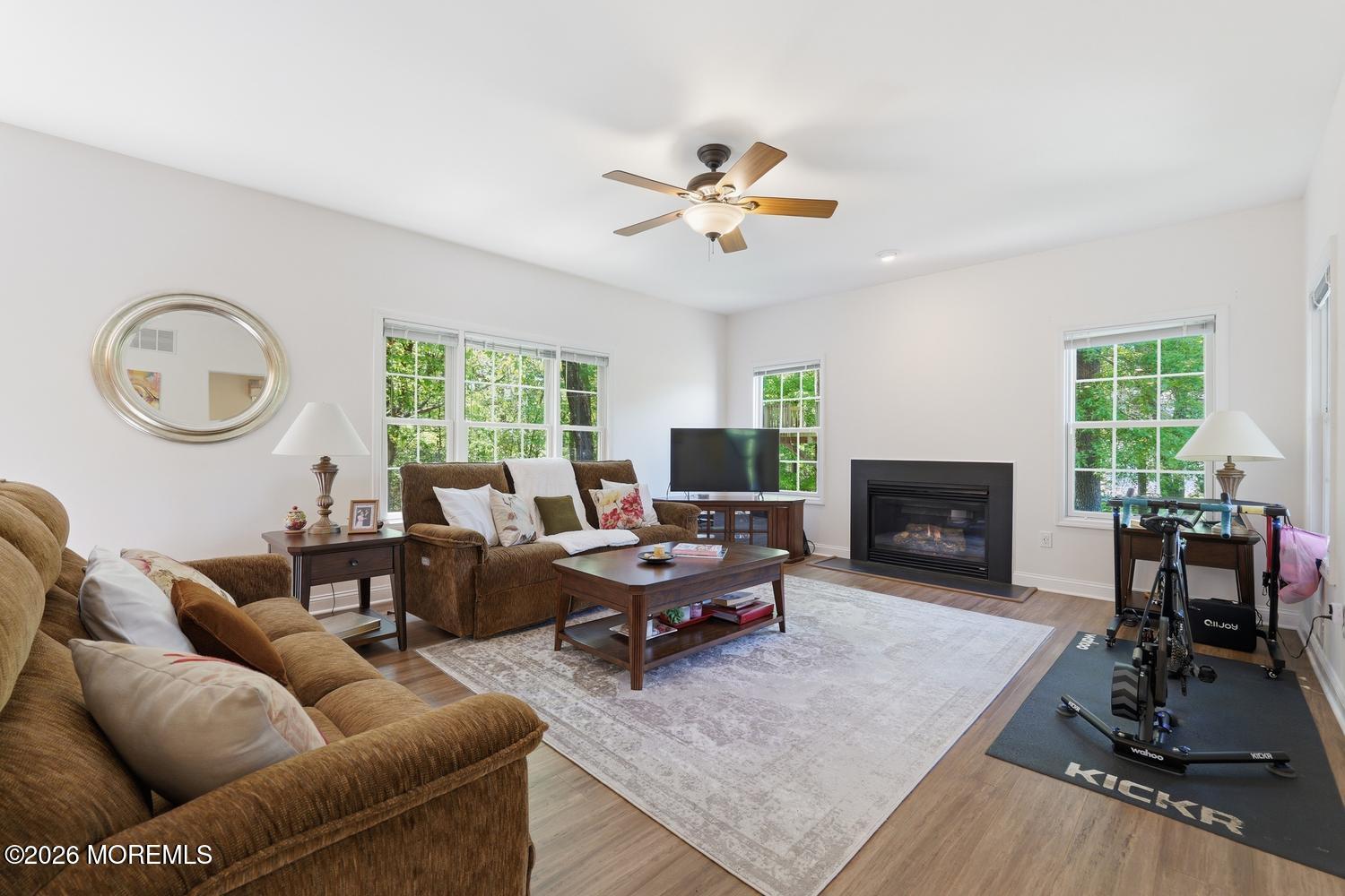 7 Cherry Tree Lane Cream Ridge, NJ 08514 - Photo 13 of 47 a living room with furniture and a fireplace