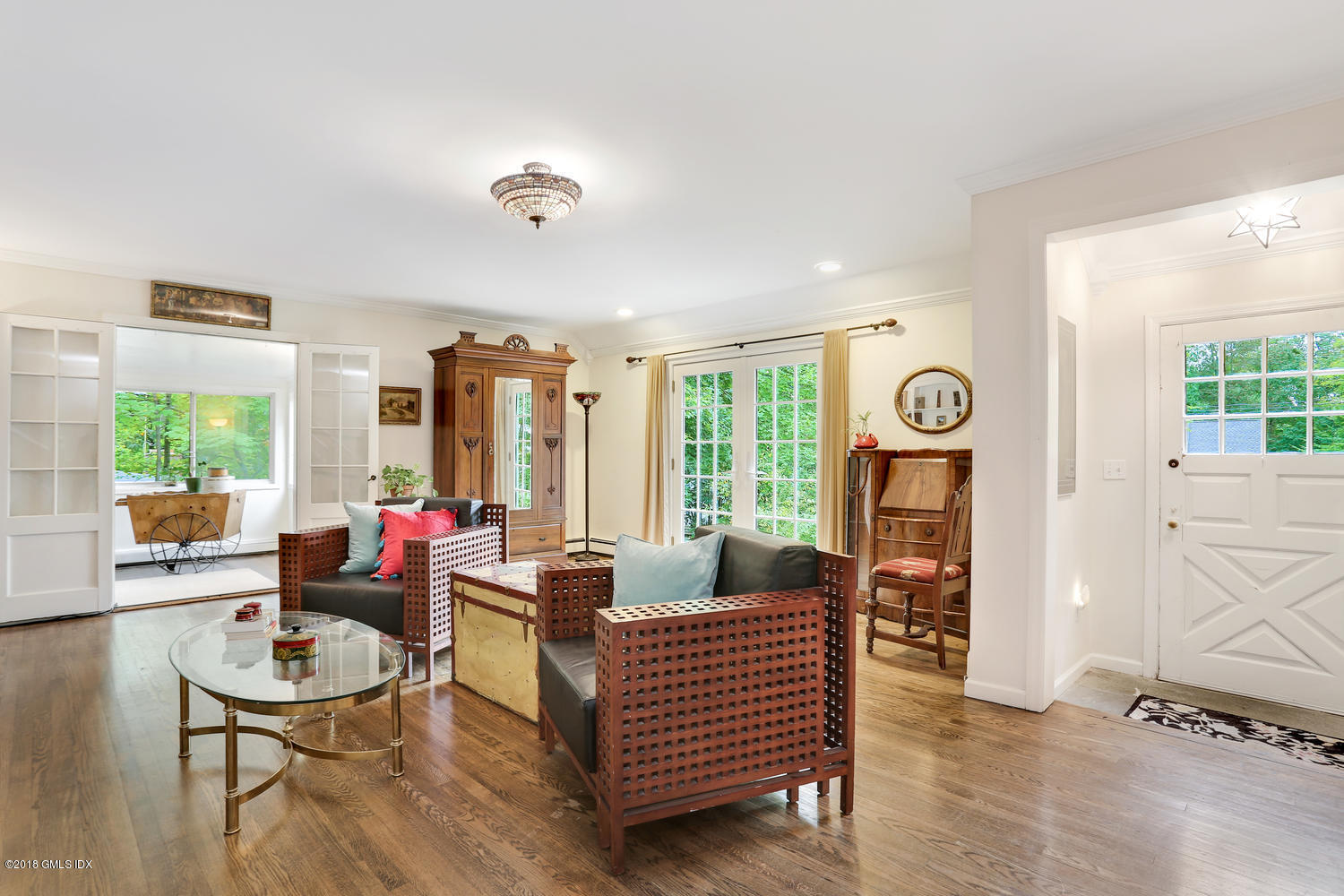 125 Hendrie Avenue Riverside, CT 06878 - Photo 3 of 24 a living room with furniture and a window