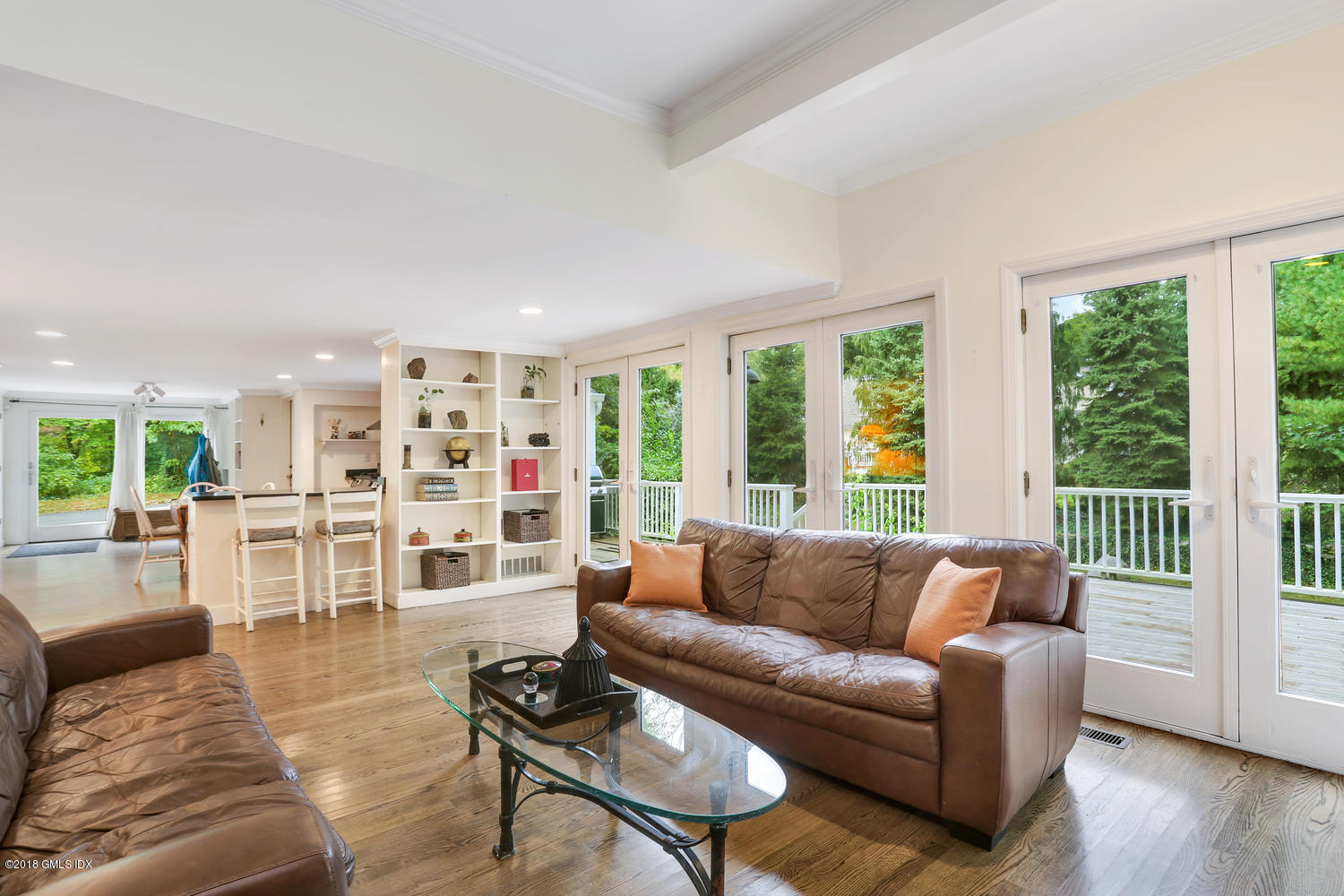 125 Hendrie Avenue Riverside, CT 06878 - Photo 10 of 24 a living room with furniture and a large window