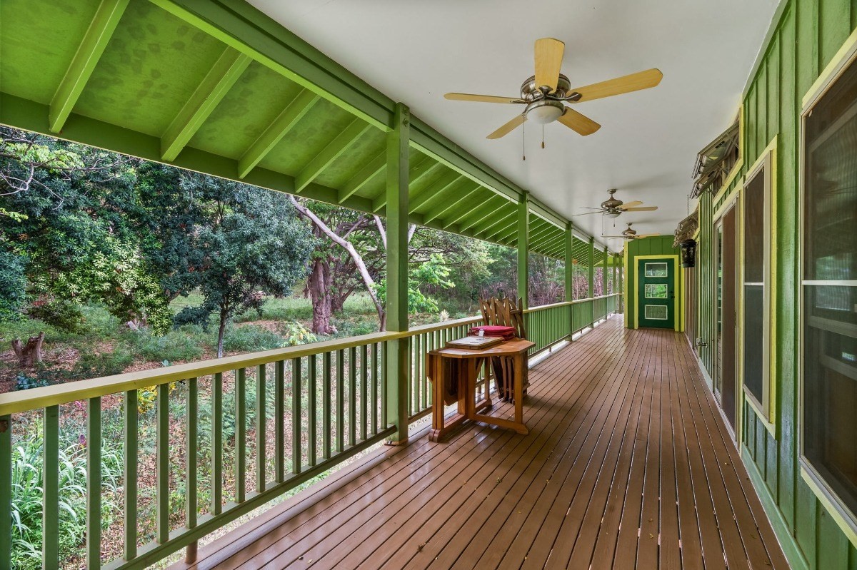 5011 Awawa Road Kalaheo, HI 96741 - Photo 14 of 30 a view of a chairs and table in the balcony