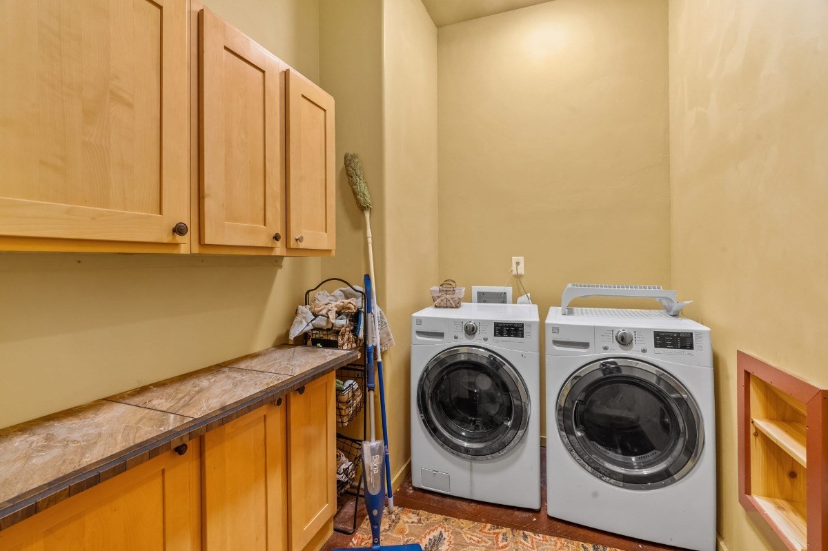 5011 Awawa Road Kalaheo, HI 96741 - Photo 25 of 30 a utility room with dryer and washer