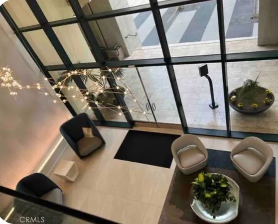 a table with chairs and a lamp on it