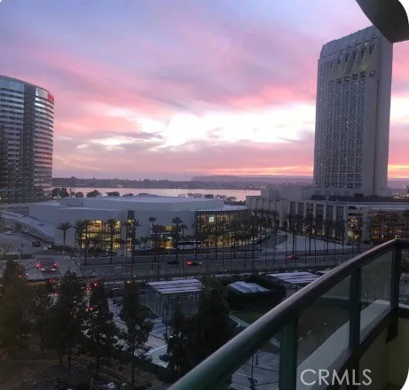 a view of a city with tall buildings