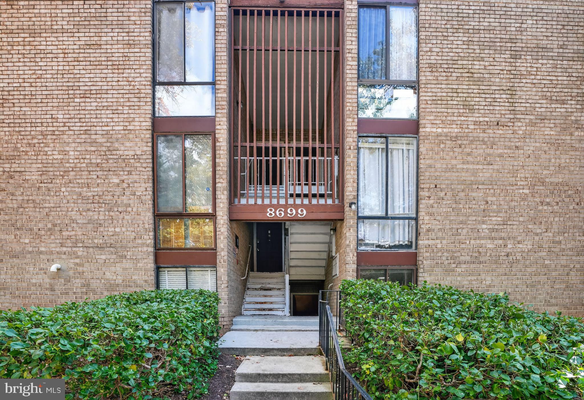 a front view of a house with a garage