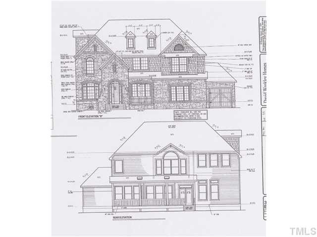 Gorgeous transitional elevation with stone arches and foundation. Sits up on a cul-de-sac lot, excellent curb appeal! Installing drywall 11/15/11. Exterior Front