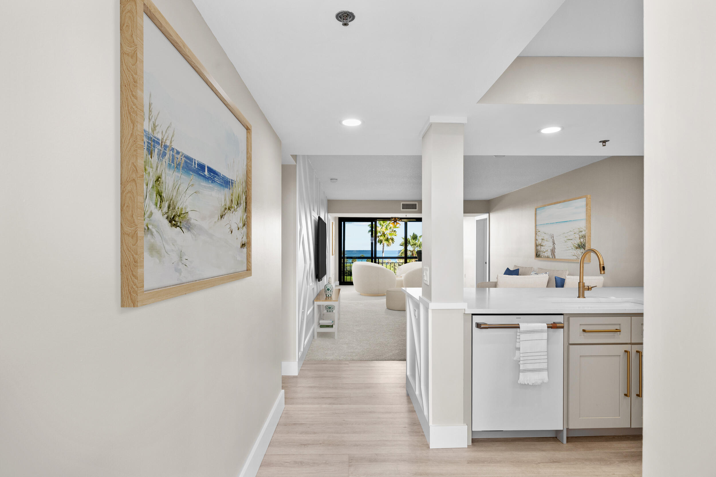 401 South Seas Drive, Unit 505 Jupiter, FL 33477 - Photo 2 of 39 a view of a hallway with furniture and window