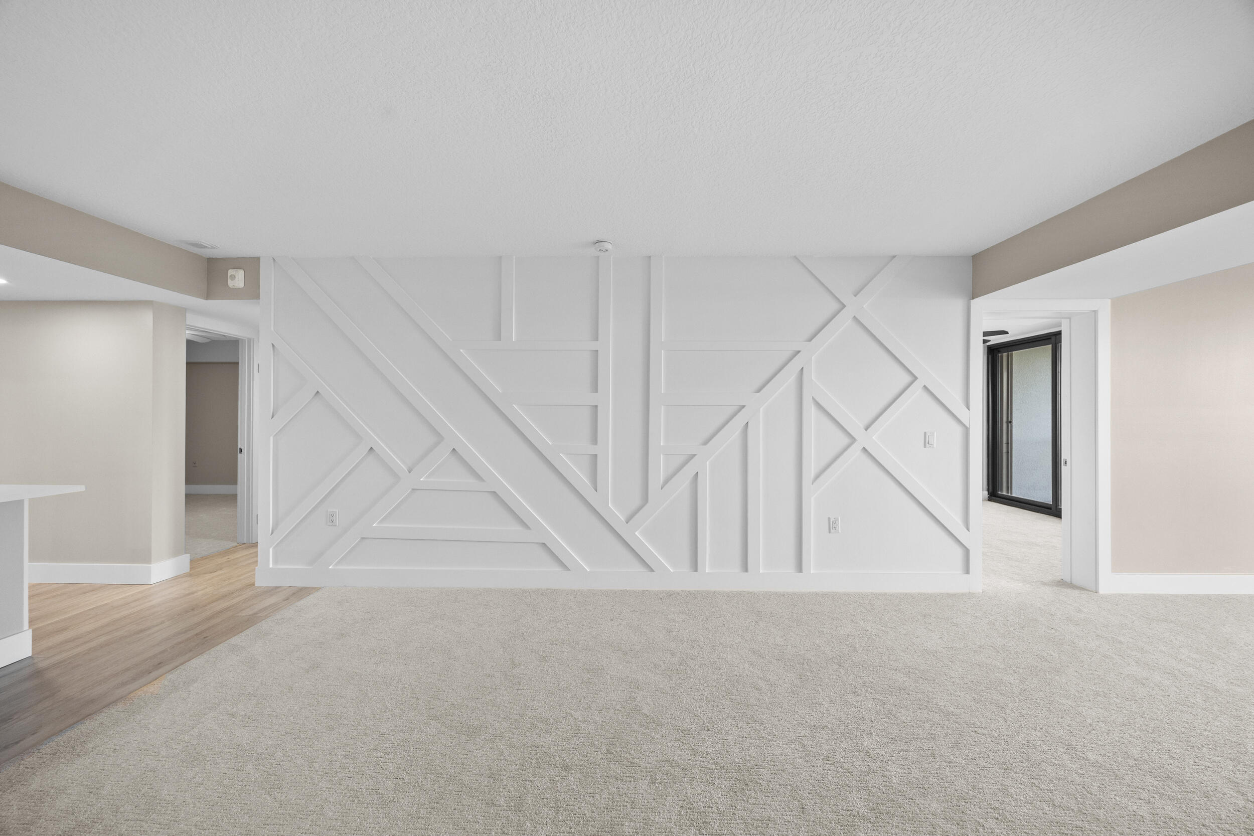 401 South Seas Drive, Unit 505 Jupiter, FL 33477 - Photo 21 of 39 a view of an empty room with stairs