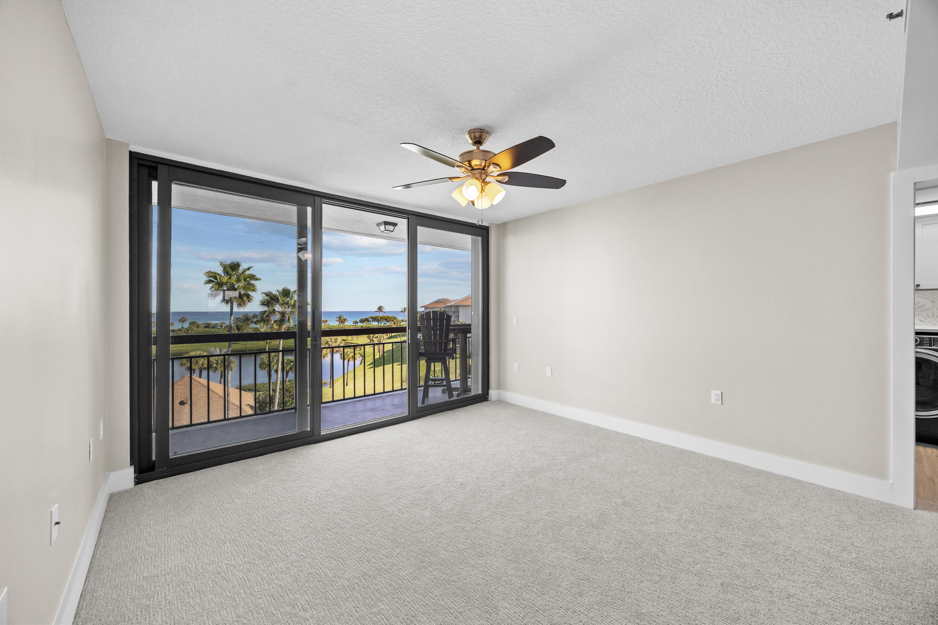 401 South Seas Drive, Unit 505 Jupiter, FL 33477 - Photo 22 of 39 wooden floor in an empty room with a window