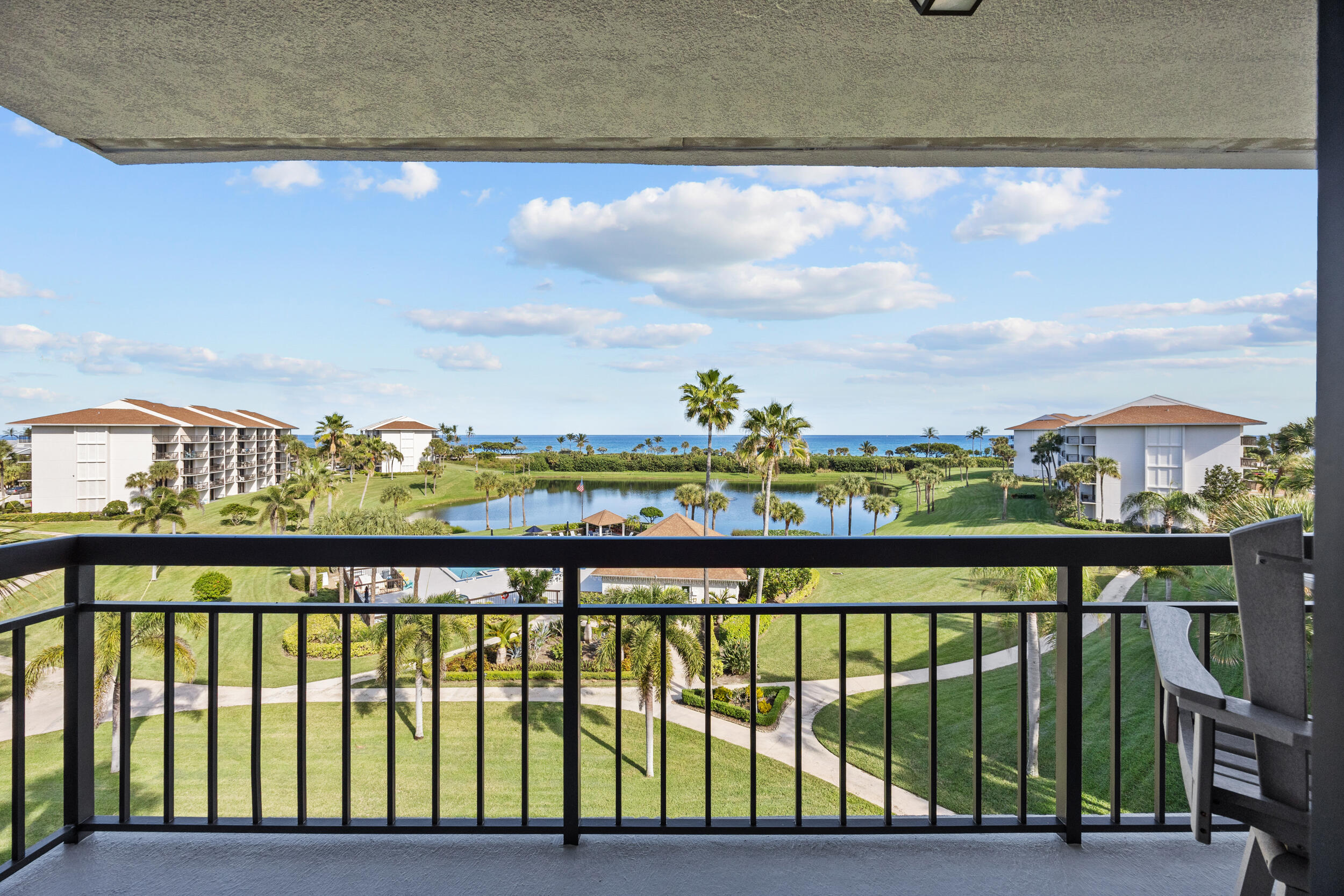 401 South Seas Drive, Unit 505 Jupiter, FL 33477 - Photo 23 of 39 a view of a street view from a balcony