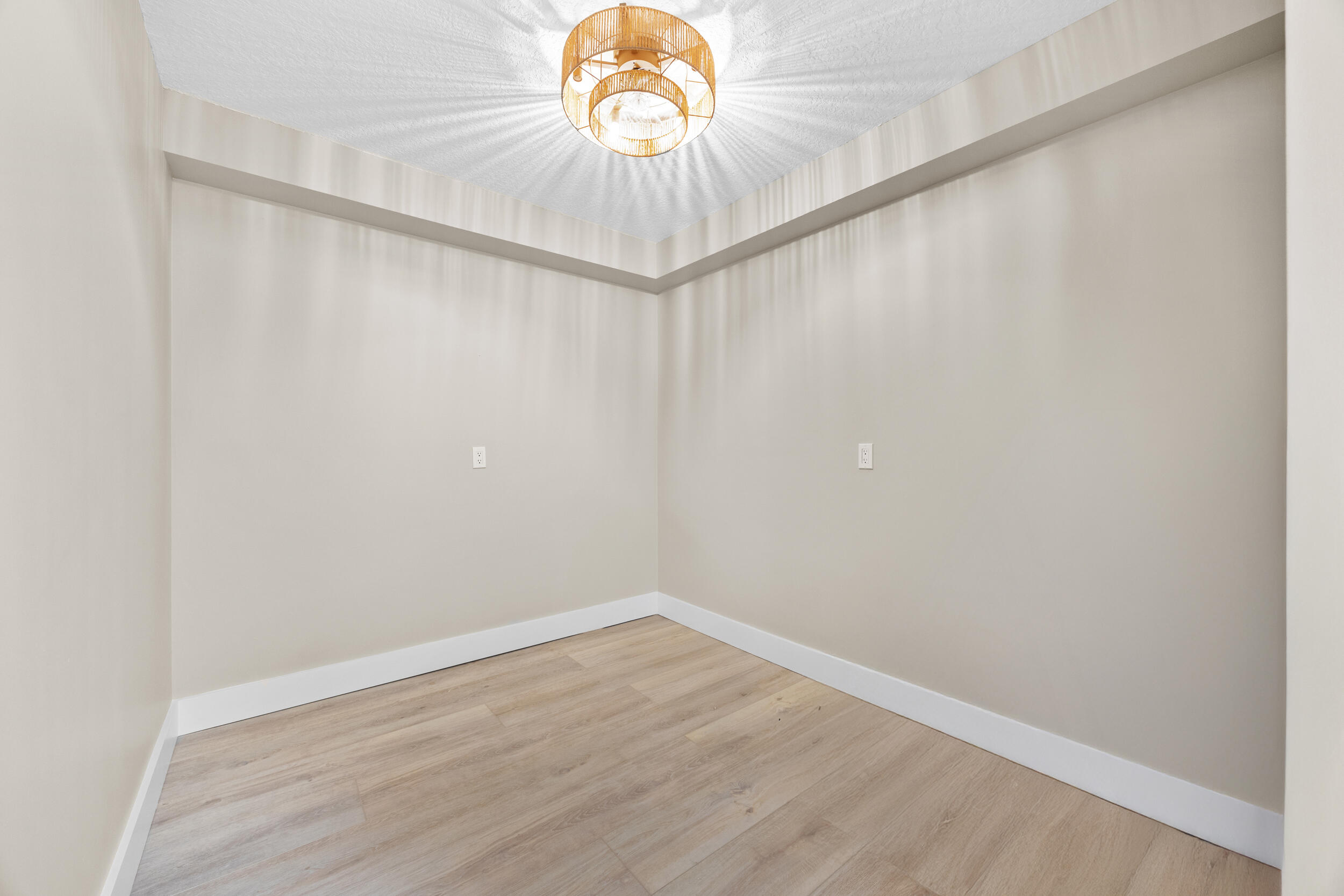 401 South Seas Drive, Unit 505 Jupiter, FL 33477 - Photo 31 of 39 a view of a hallway with a chandelier