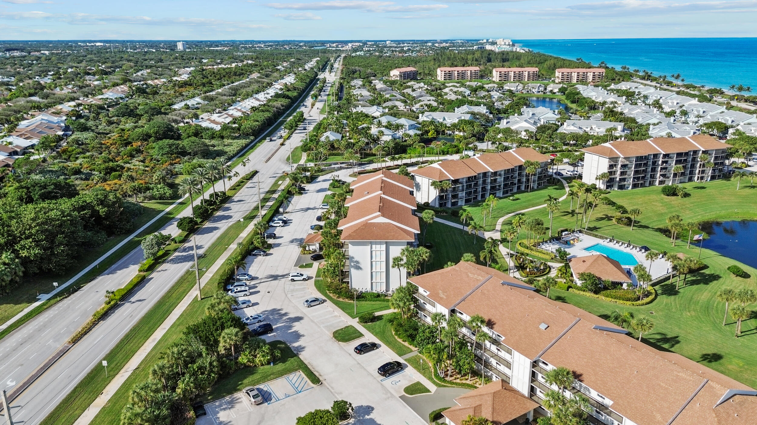 401 South Seas Drive, Unit 505 Jupiter, FL 33477 - Photo 38 of 39 an aerial view of residential houses with outdoor space
