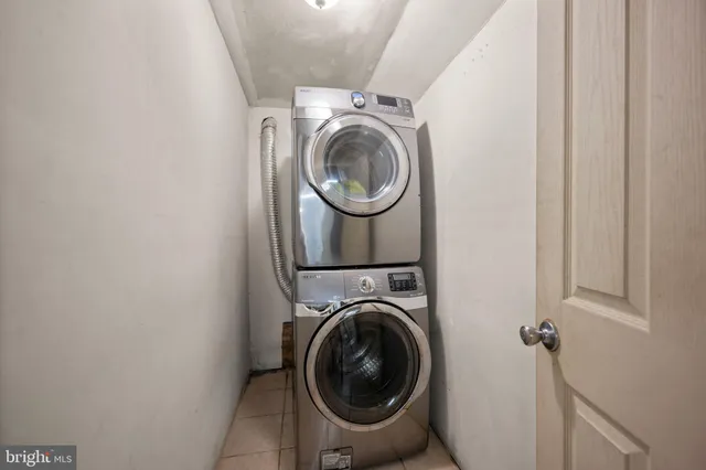 a view of a hallway to rooms