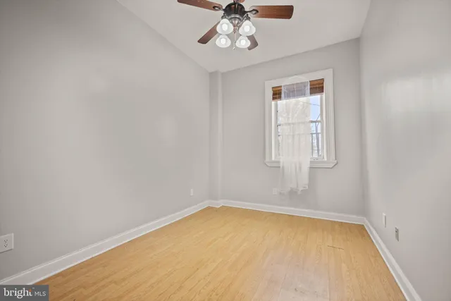 a front view of a house with parking area