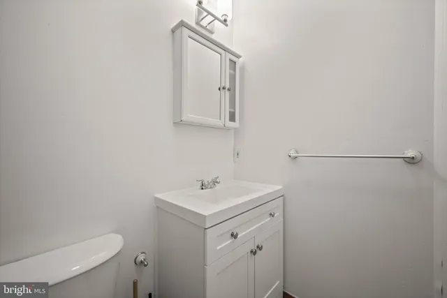a bathroom with a bathtub and a toilet