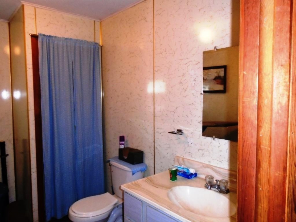 3467 South Merrillville Road Baldwin, MI 49304 - Photo 8 of 14 3467 Bathroom