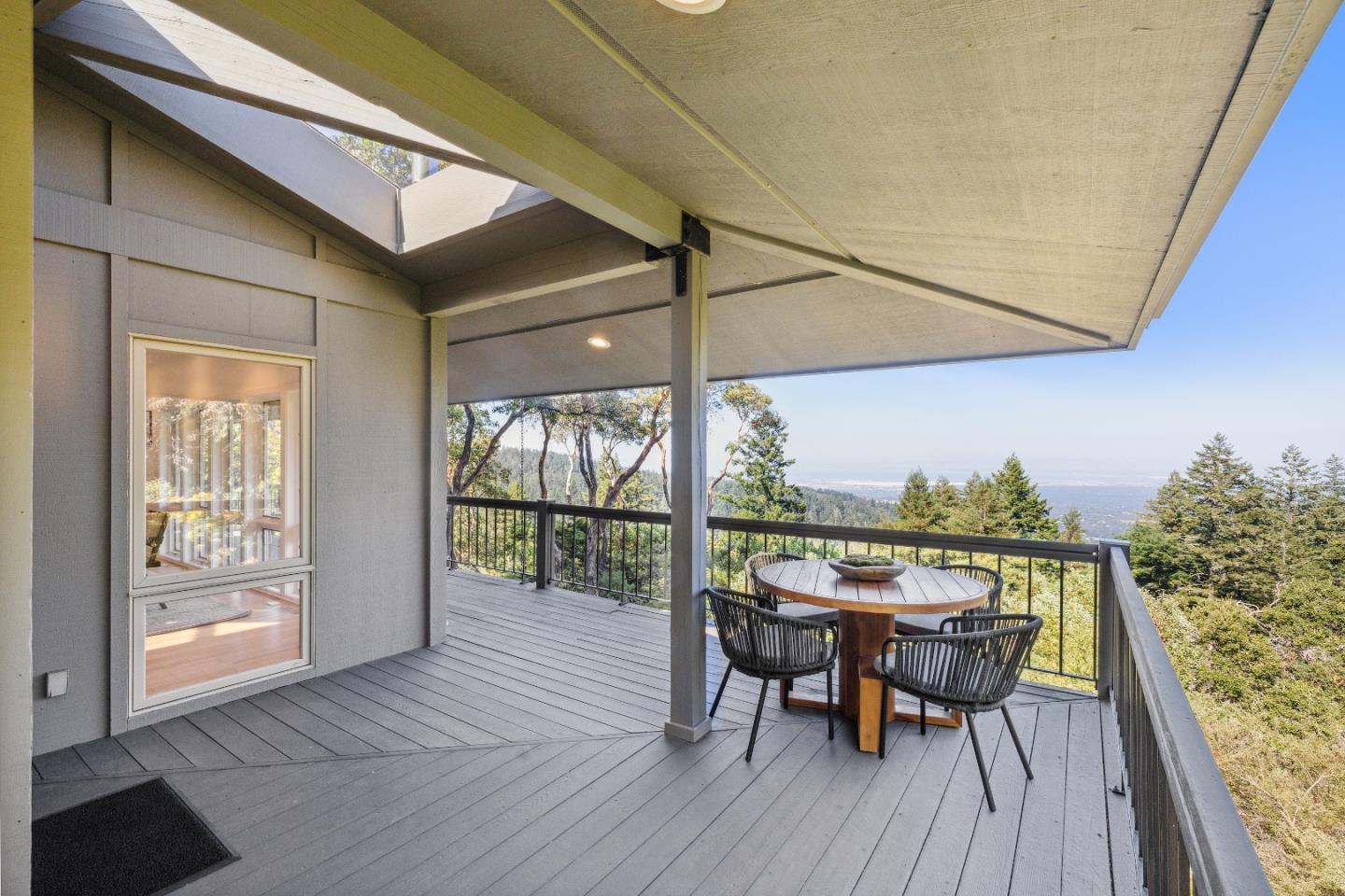 33 Bear Glen Drive Woodside, CA 94062 - Photo 15 of 33 a view of a dining room with furniture and wooden floor