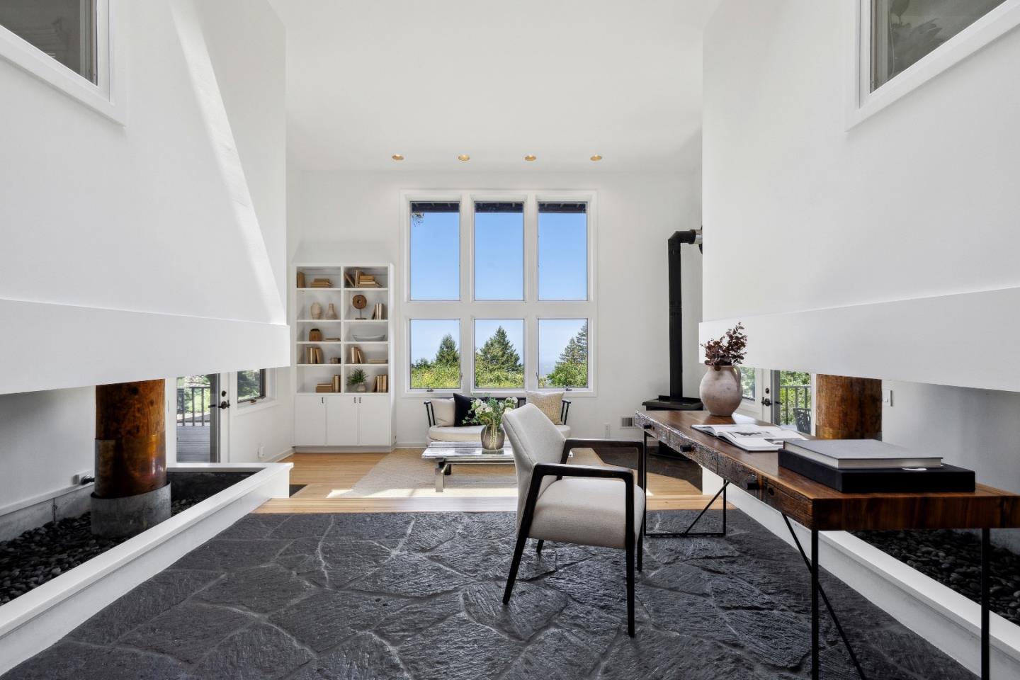 33 Bear Glen Drive Woodside, CA 94062 - Photo 20 of 33 a living room with furniture and a flat screen tv
