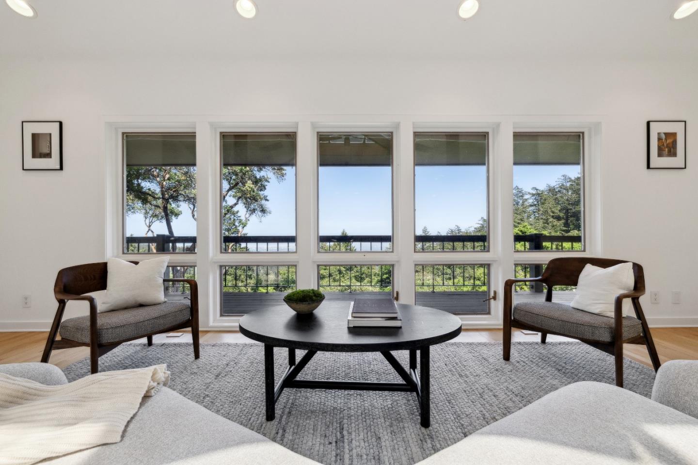 33 Bear Glen Drive Woodside, CA 94062 - Photo 8 of 33 a living room with furniture and a floor to ceiling window