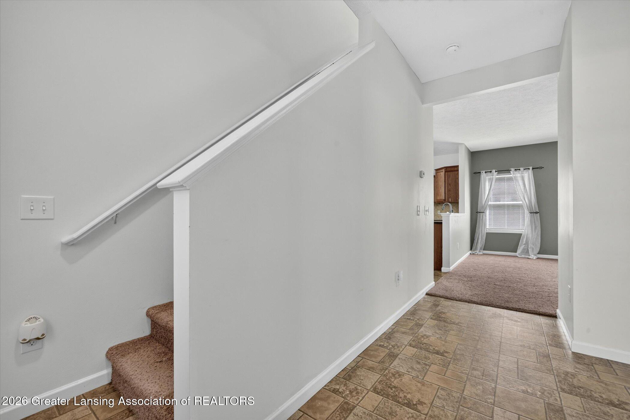47 Lake Ridge Drive Mason, MI 48854 - Photo 7 of 53 07-47-Lake-Ridge-Dr-Windowstill