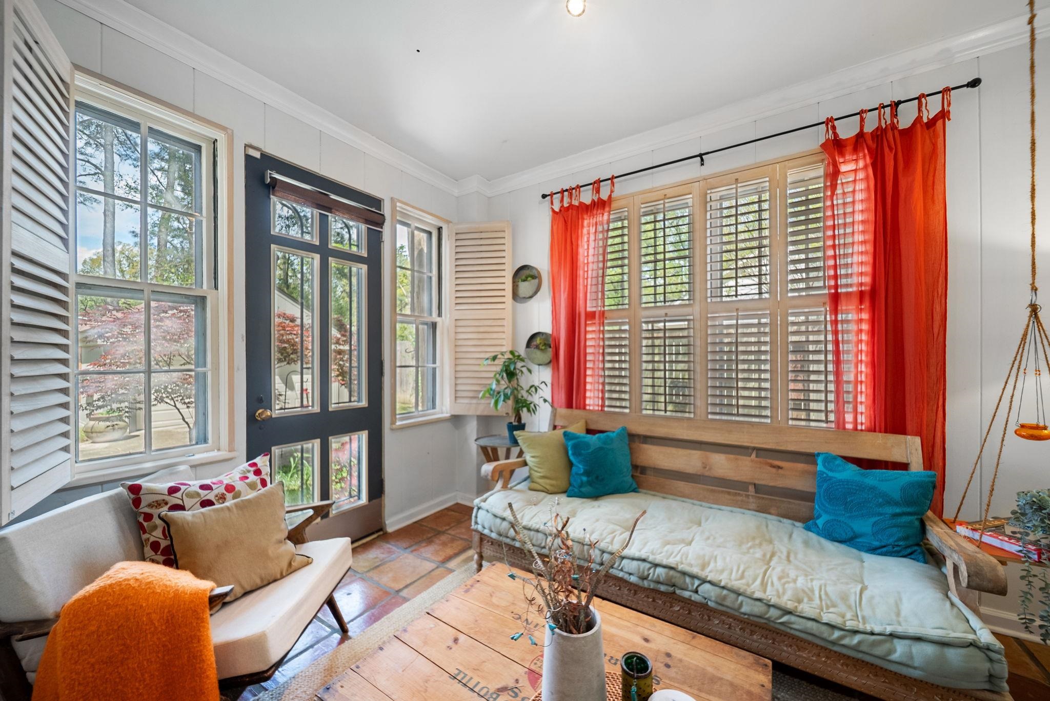267 North Rose Road Memphis, TN 38117 - Photo 12 of 40 a living room with furniture and floor to ceiling windows