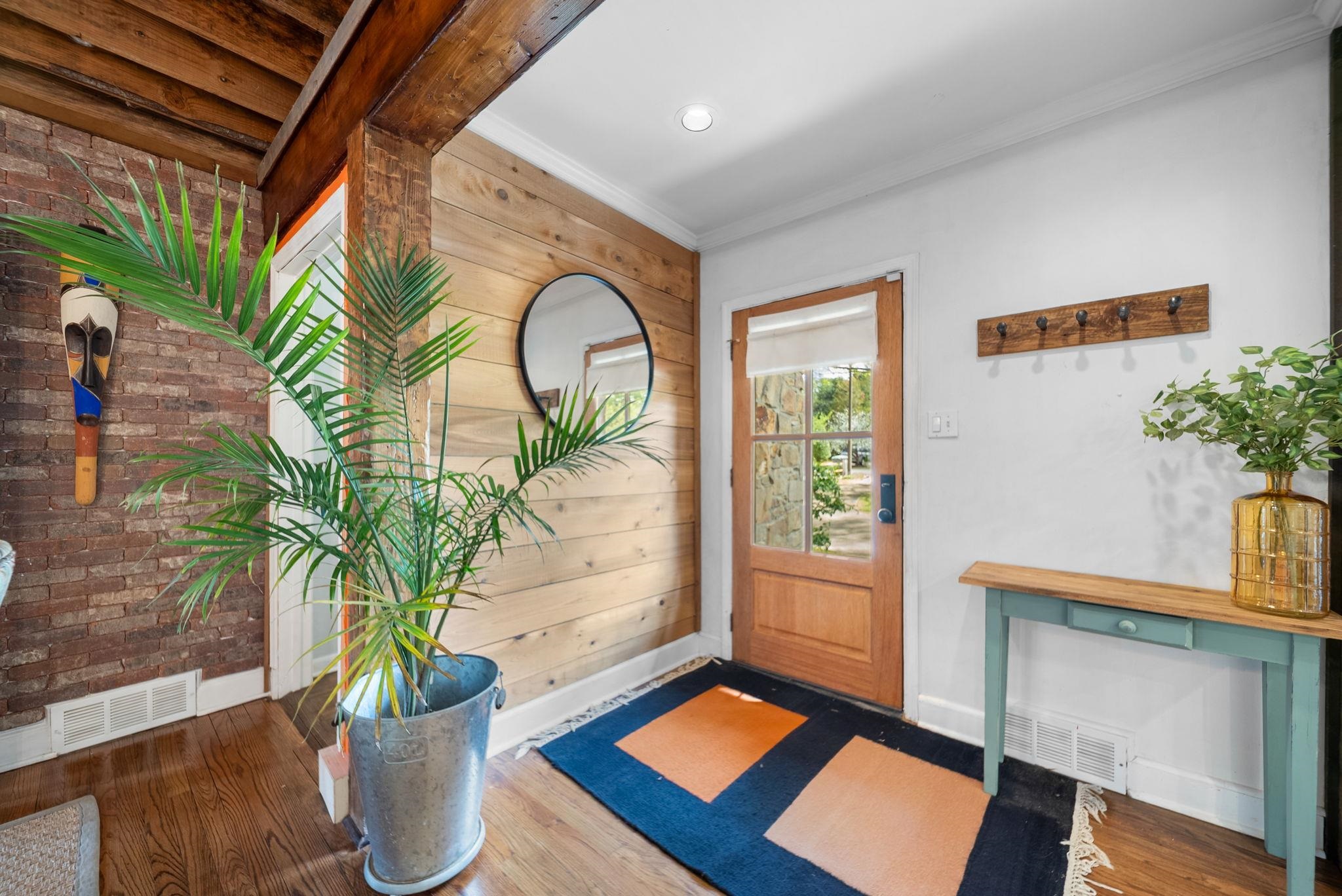 267 North Rose Road Memphis, TN 38117 - Photo 13 of 40 a living room with furniture and a potted plant