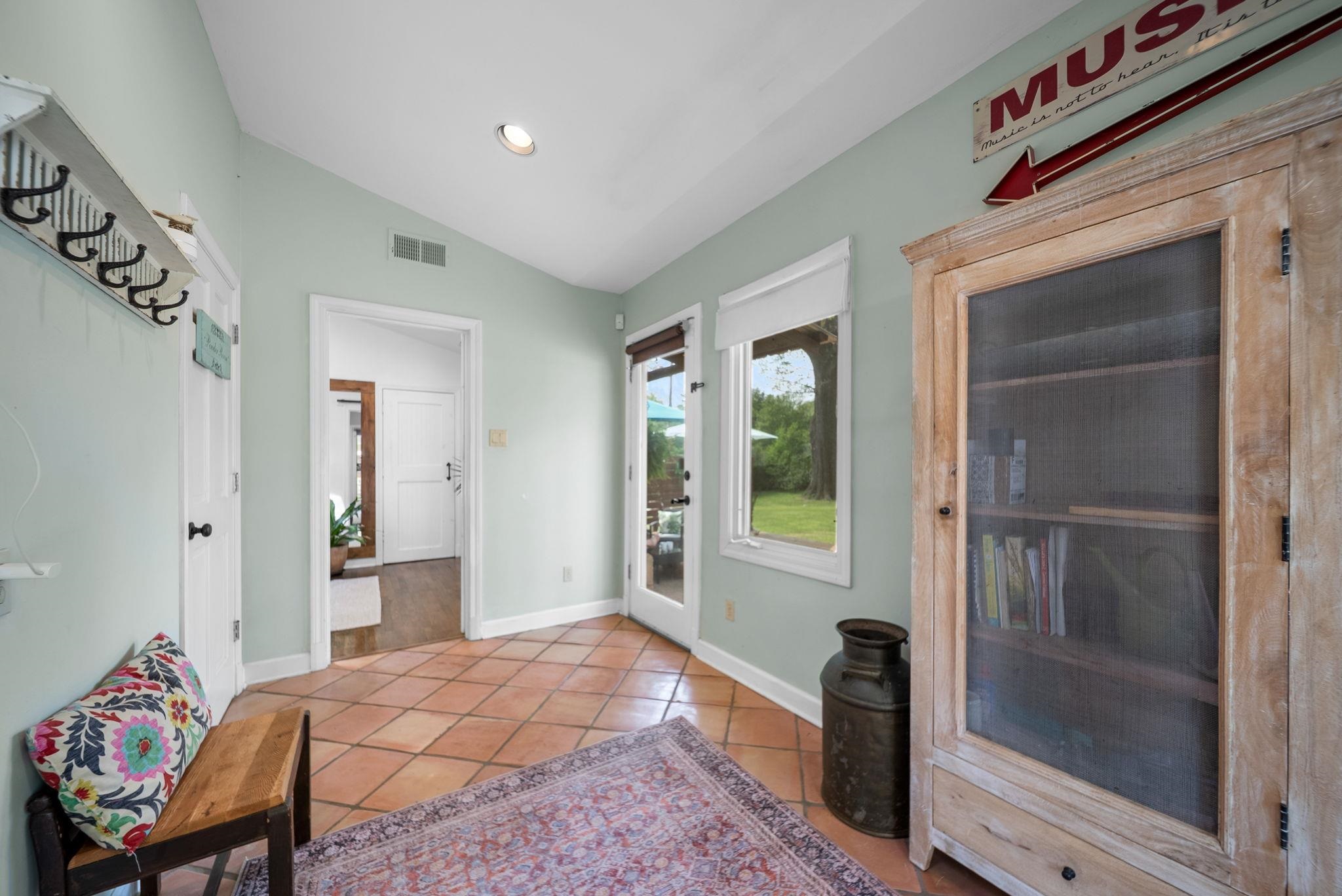 267 North Rose Road Memphis, TN 38117 - Photo 15 of 40 a bedroom with a bed and a window