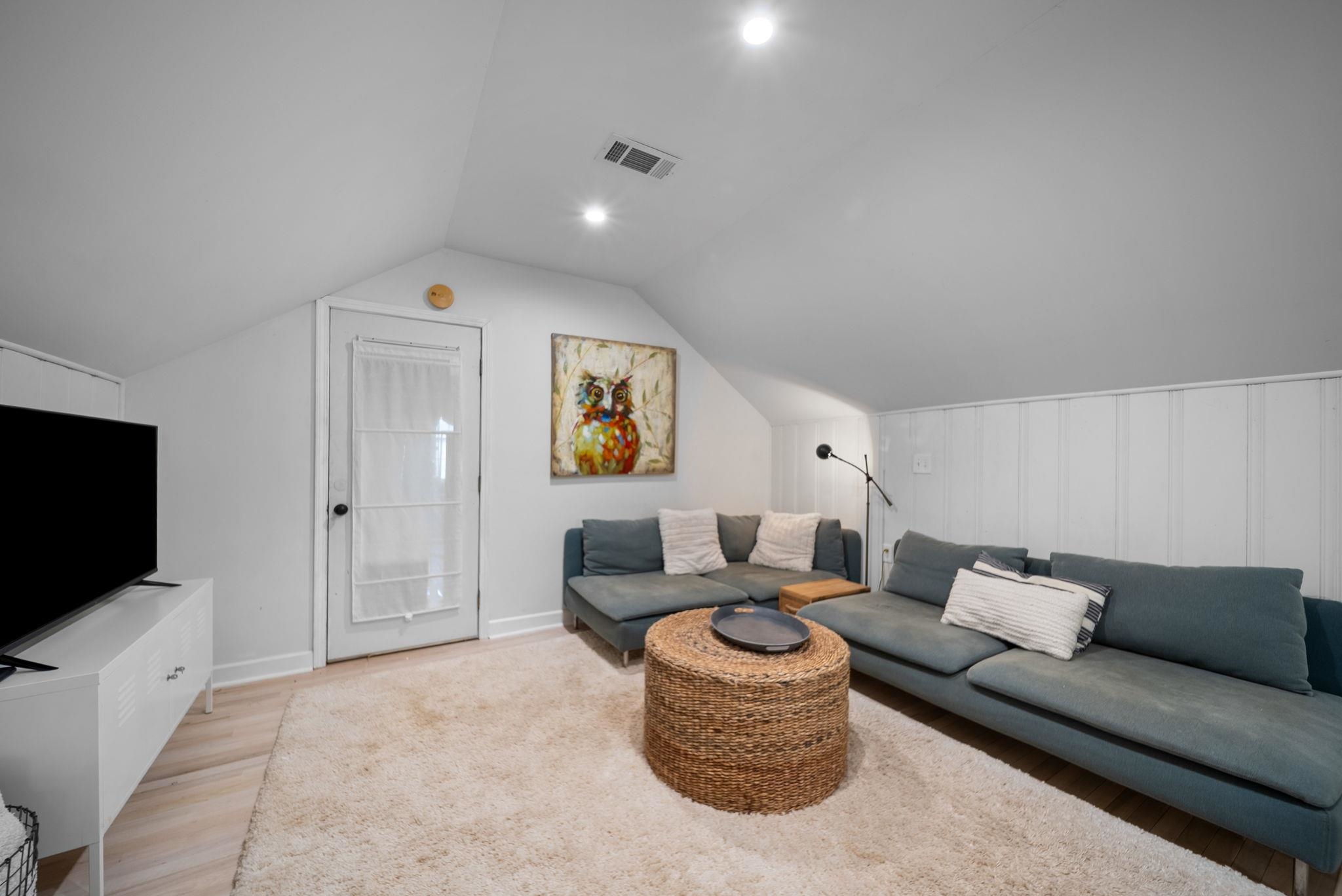 267 North Rose Road Memphis, TN 38117 - Photo 17 of 40 a living room with furniture and a flat screen tv