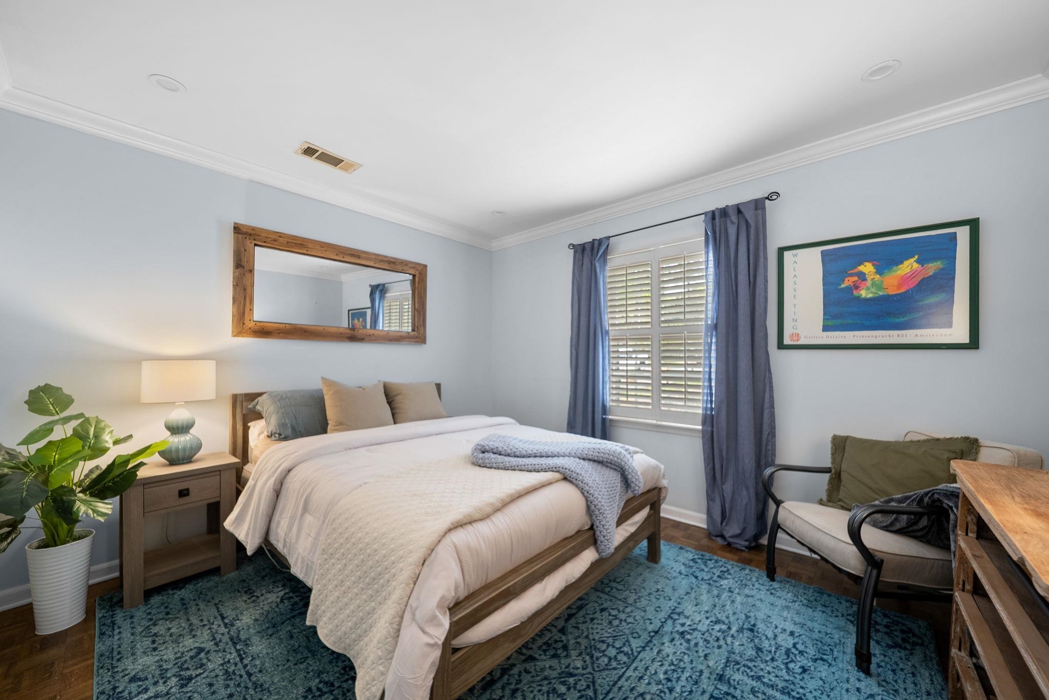 267 North Rose Road Memphis, TN 38117 - Photo 21 of 40 a bed room with a bed and a couch