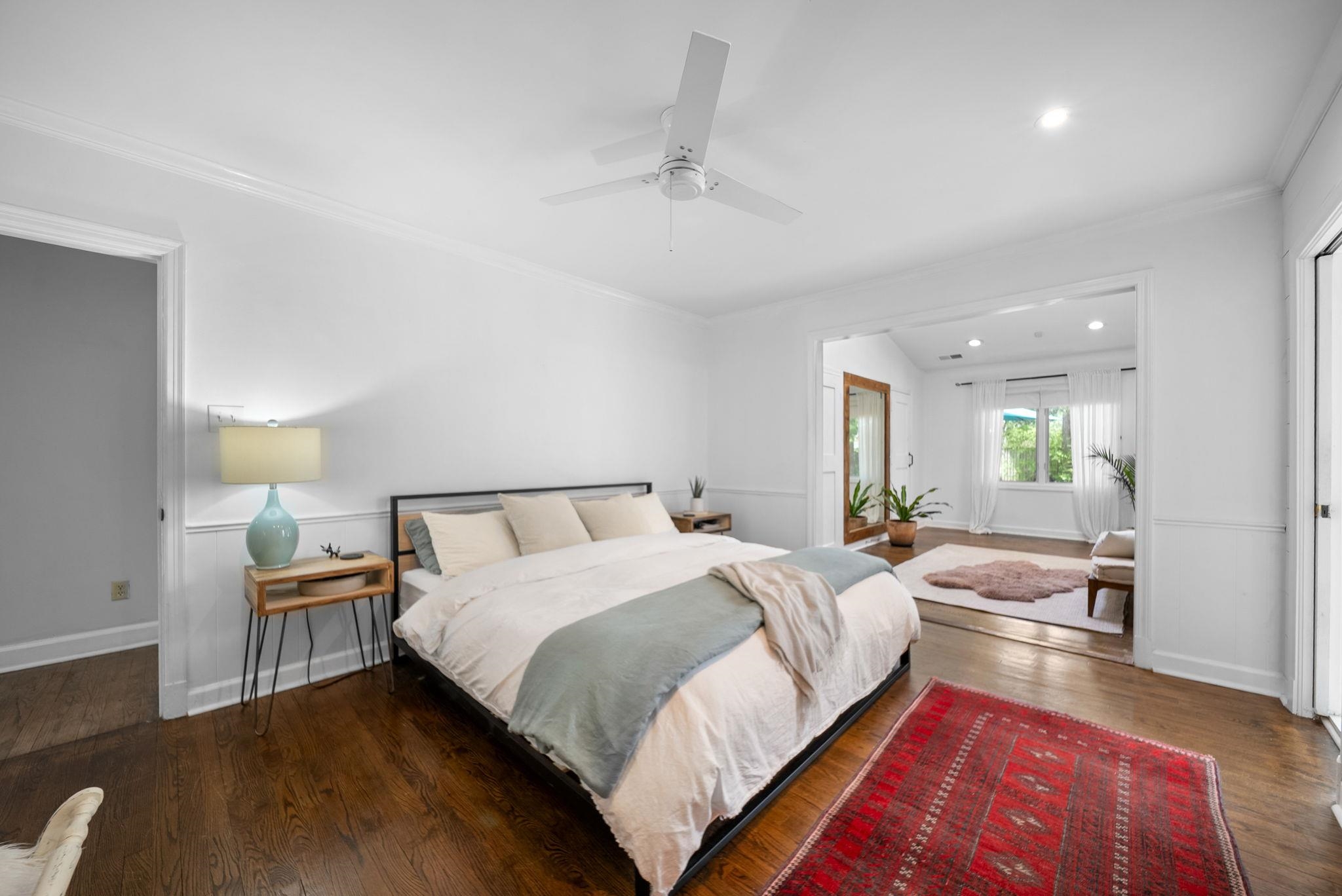 267 North Rose Road Memphis, TN 38117 - Photo 22 of 40 a bedroom with a bed and wooden floor