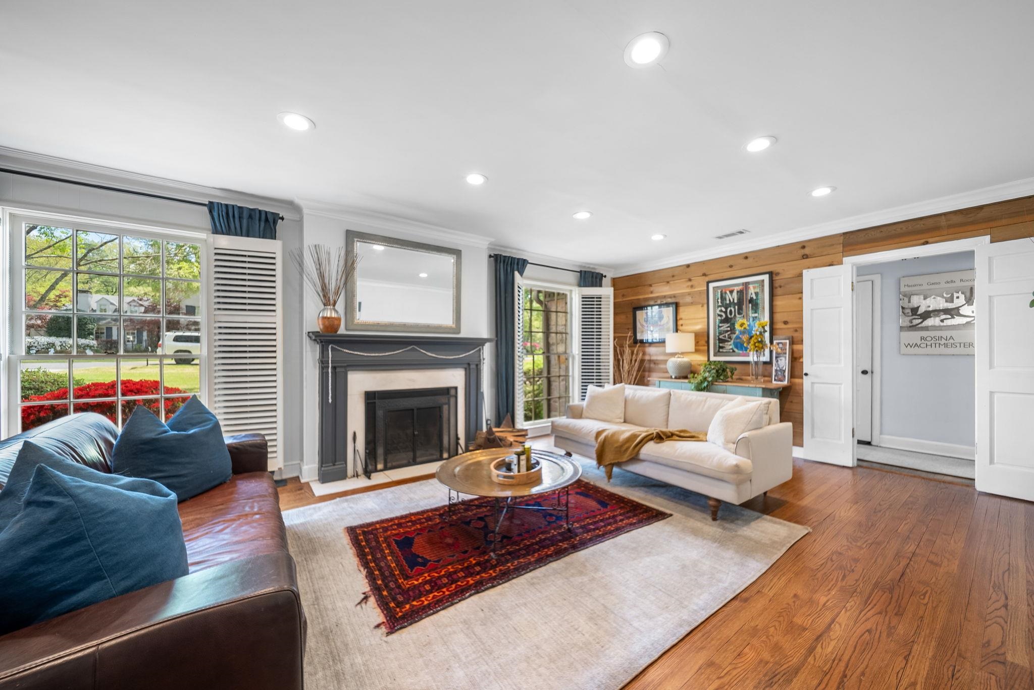 267 North Rose Road Memphis, TN 38117 - Photo 3 of 40 a living room with furniture and a fireplace