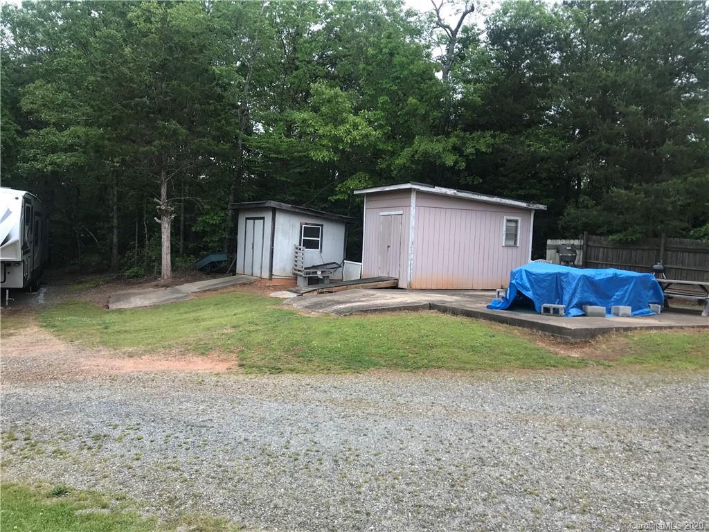 480 Hester Mill Road Rutherfordton, NC 28139 - Photo 8 of 38 a front view of house with yard and outdoor seating