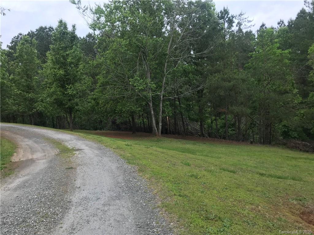 480 Hester Mill Road Rutherfordton, NC 28139 - Photo 10 of 38 a view of a field of grass and trees