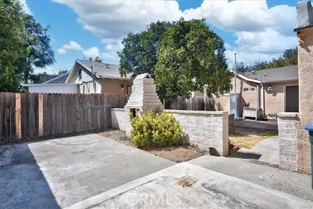 a view of a backyard of the house