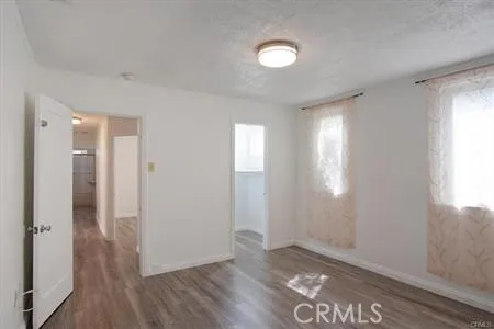 a view of livingroom with hardwood floor and window