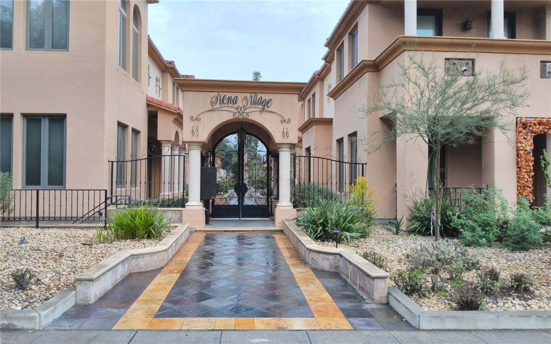 a view of entrance gate of house