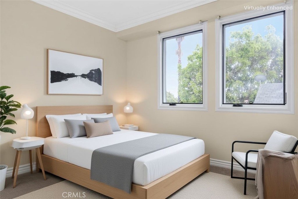 66 Allen Avenue, Unit 3 Pasadena, CA 91106 - Photo 15 of 25 a bedroom with a bed and a painting on the wall