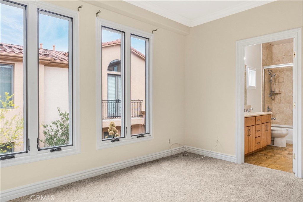 66 Allen Avenue, Unit 3 Pasadena, CA 91106 - Photo 17 of 25 an empty room with windows and closet