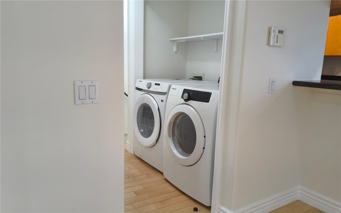 66 Allen Avenue, Unit 3 Pasadena, CA 91106 - Photo 25 of 25 a utility room with dryer and washer
