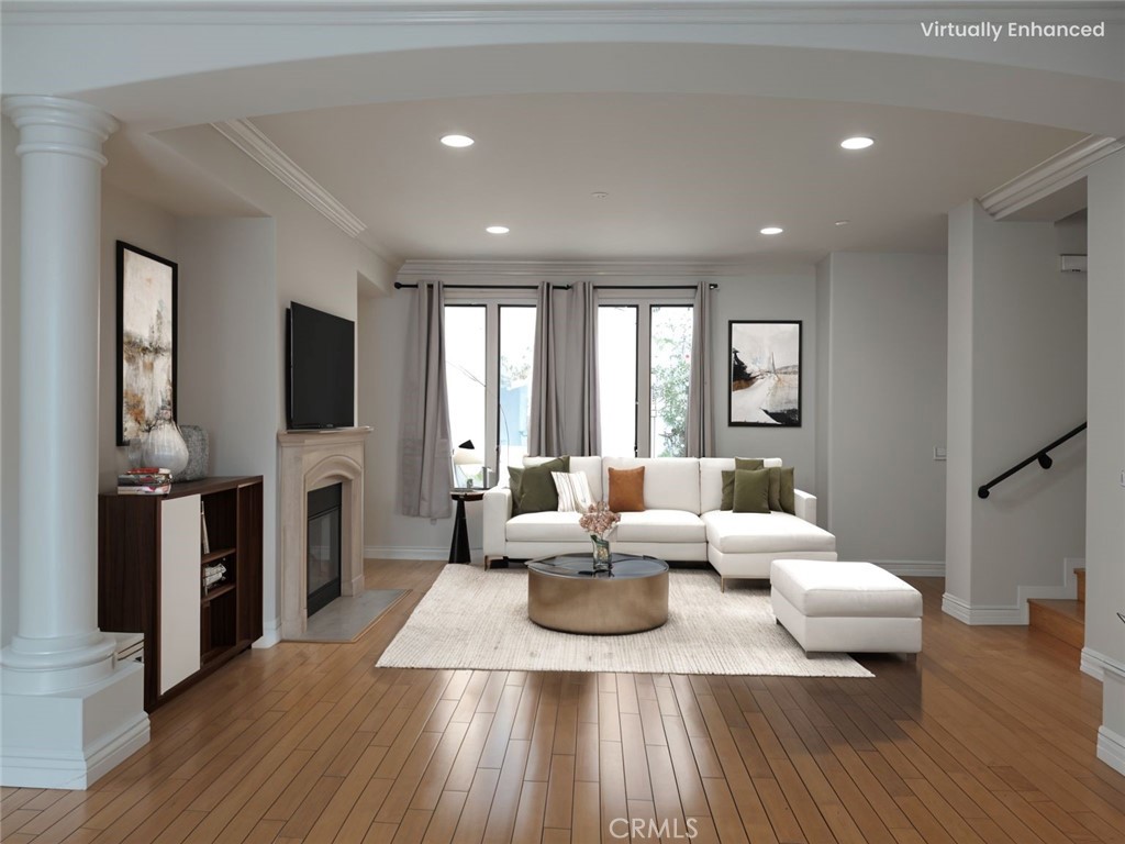 66 Allen Avenue, Unit 3 Pasadena, CA 91106 - Photo 6 of 25 a living room with furniture and a flat screen tv